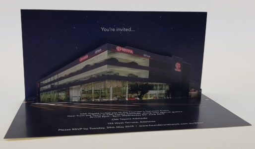 Custom invitation card with a featured pop-up for CMI Toyota
