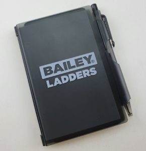 Bailey Ladders hardcover notebook and pen promotional merchandise.