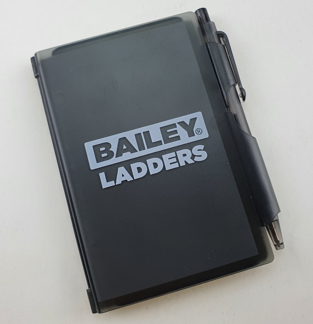 Bailey Ladders promotional hardcover notebook and pen.