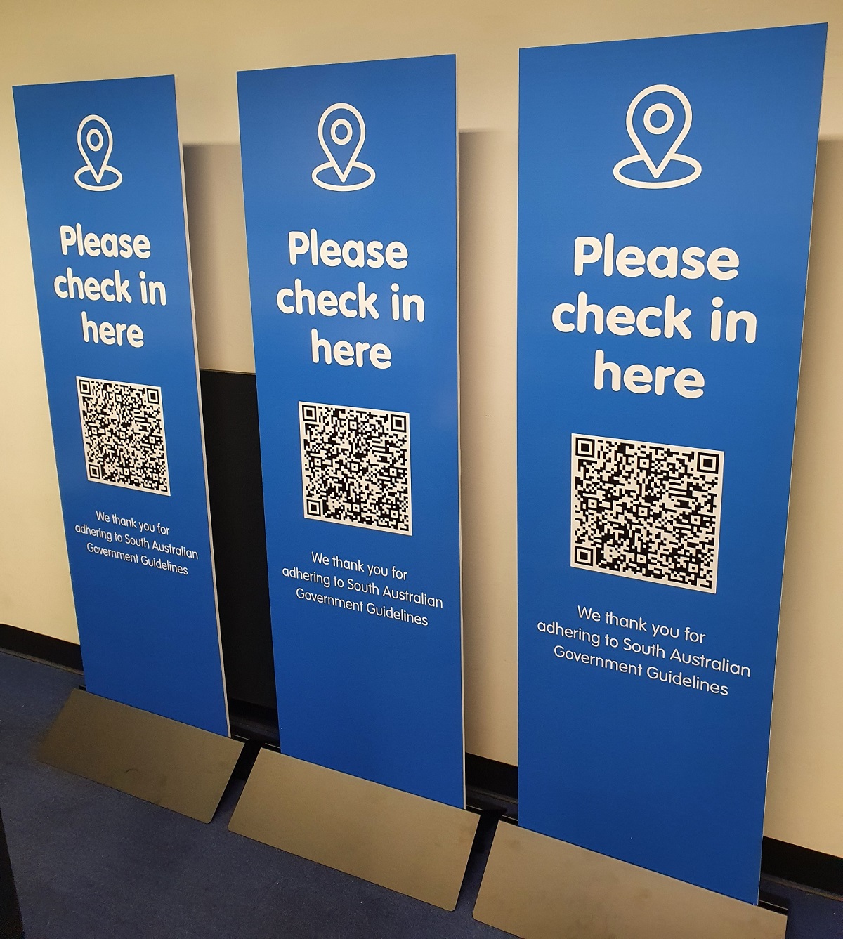 Signs for COVID check-in